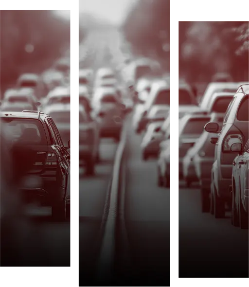 Diesel Emission Claims Featured Image. Image shows two lanes of a road that is heavily congested with vehicles. The image is split into three vertical rectangle sections with a gradient overlay of deep red to grey from top to bottom.
