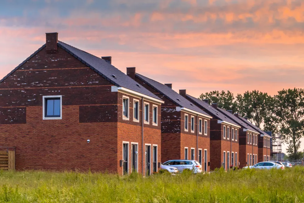 Living in Social Housing: 10 Disturbing Facts - Image shows a set of semi-detached homes.