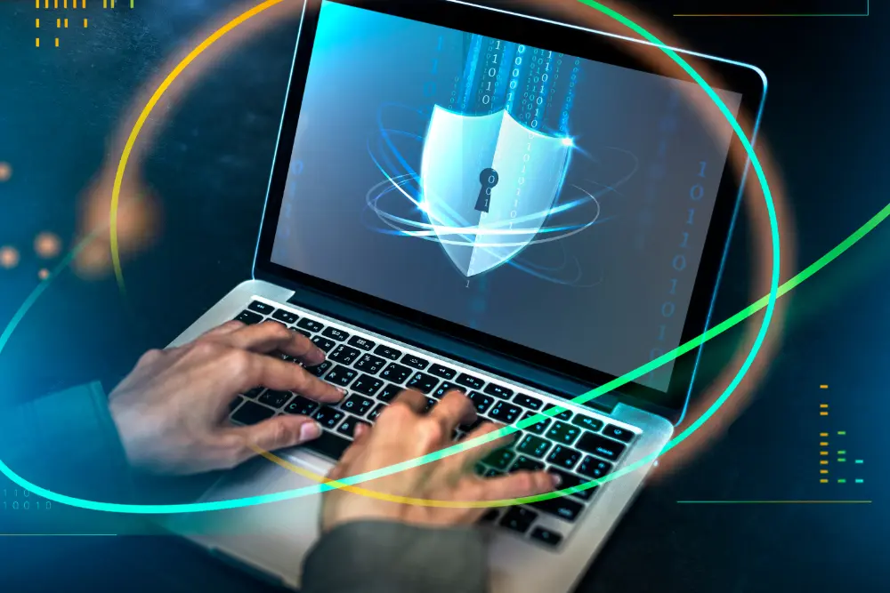 What Is Data Sharing Featured Image - Image shows hacker cracking a security code on a laptop screen